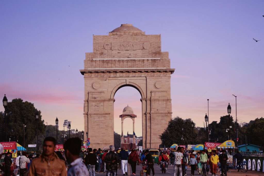 India Gate, a solemn and iconic war memorial in Delhi, honors the sacrifices of soldiers with its impressive arch and eternal flame. countless tourist visit india to see India gate.The India Gate serves as a major draw for tourists participating in one-day Delhi city tours conducted by car.